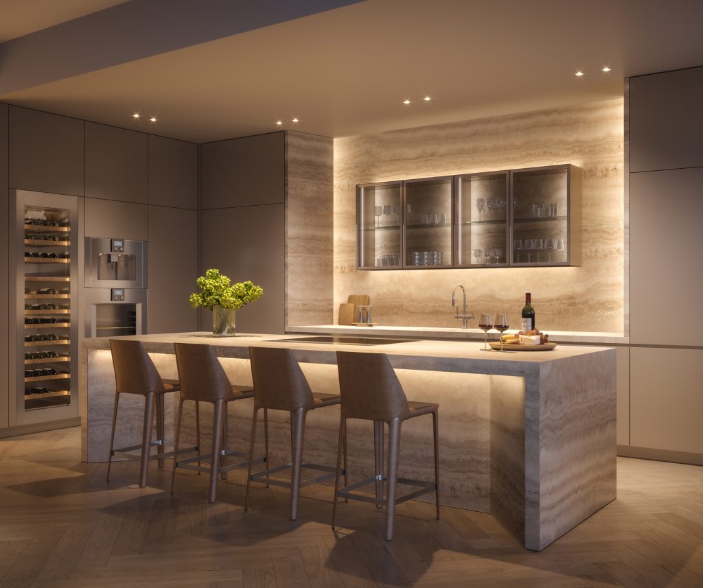 Pagani Residences kitchen with travertine stone countertops at evening